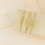 INFINITY STACKING BRACELET - GOLD