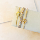 TWISTED STACKING BRACELET - GOLD