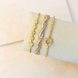 TWISTED STACKING BRACELET - GOLD